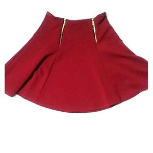 Cranberry red skirt.